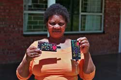 Crafter Shows Keyrings After Workshop